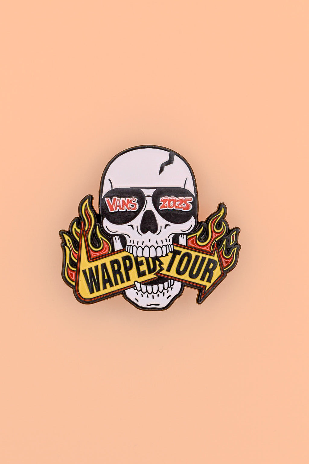Skull with sunglass that read "Vans 2025" biting a sign that reads "Warped Tour"